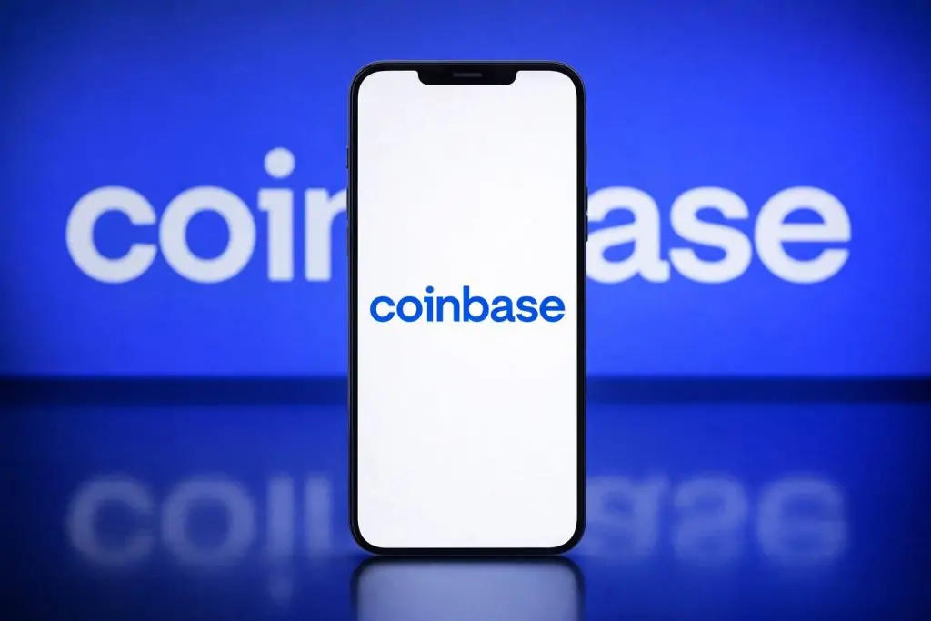 Coinbase stock dips after Needham cuts target to $290 on weak crypto volumes