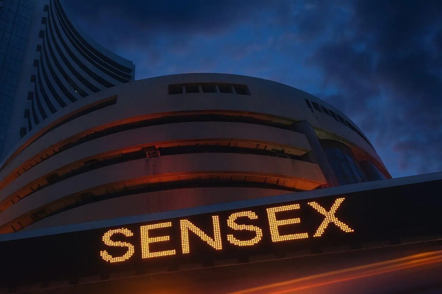 Sensex Jumps 449 Points, Nifty Reclaims 26,000 as Metal and Realty Stocks Rally on Fed Tailwinds