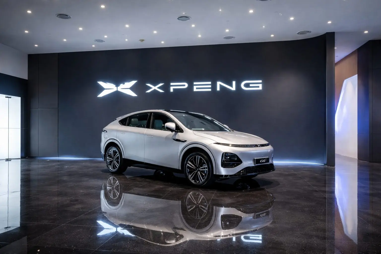 XPeng stock slips before the open on 600,000-vehicle 2026 target — what traders watch next