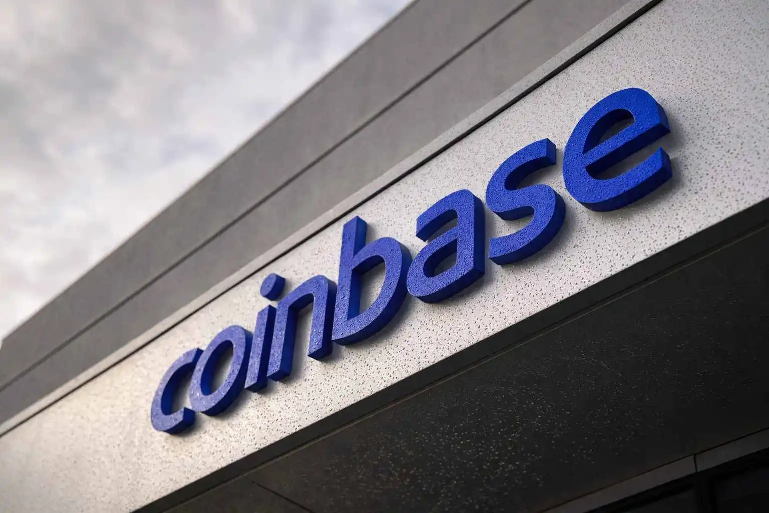 Coinbase stock price slides after hours as bitcoin dips below $85,000 and White House stablecoin talks near