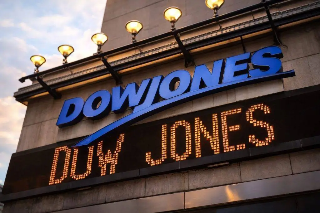 Dow Jones closes flat after Fed; Microsoft drops, IBM jumps in after-hours ahead of Apple earnings