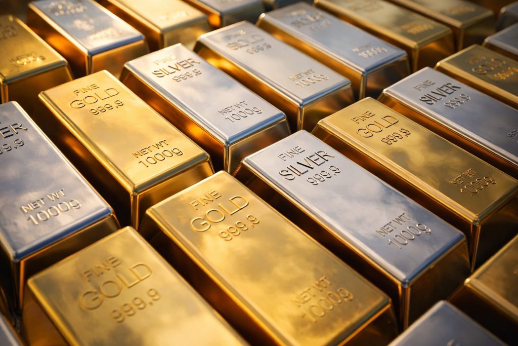Silver breaks $100 as gold nears $5,000 — what’s driving the record precious-metals run