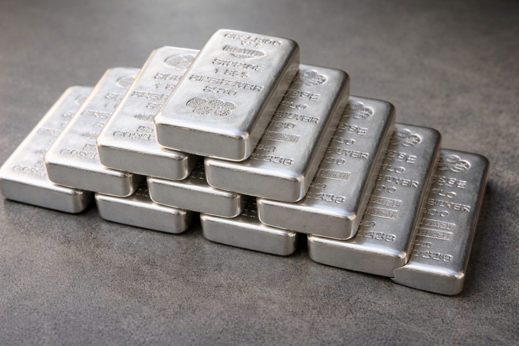 Silver price breaks $100 as futures settle at records; SLV jumps before Fed decision