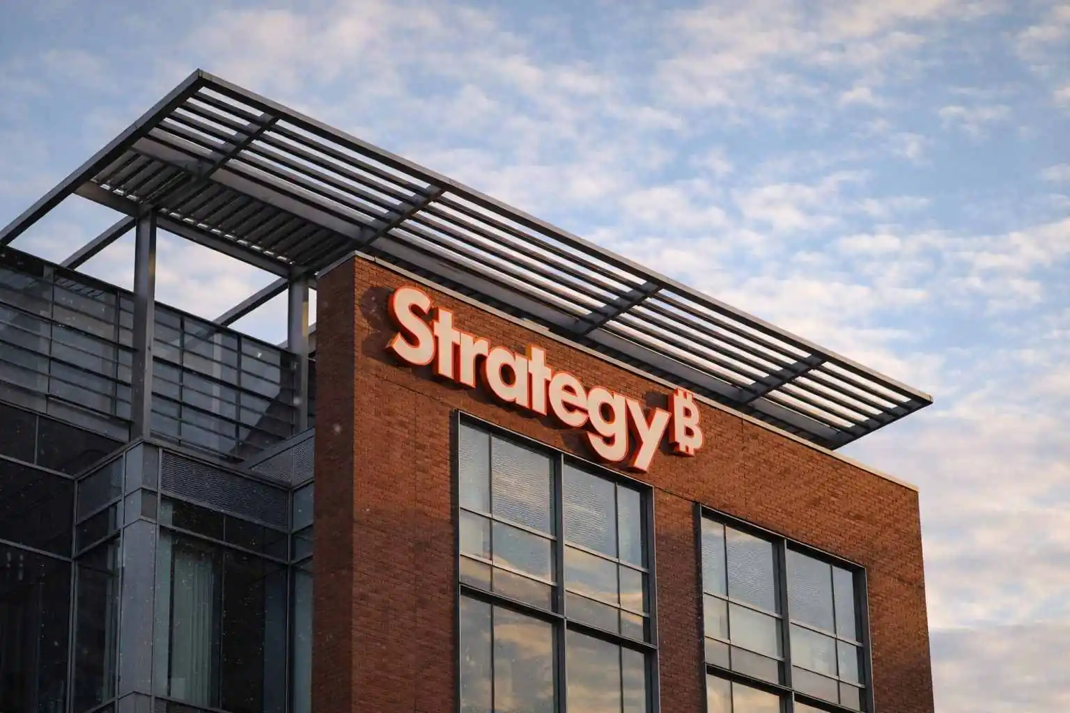 Strategy (MSTR) stock slips as bitcoin dips below its cost line — and the firm buys more anyway