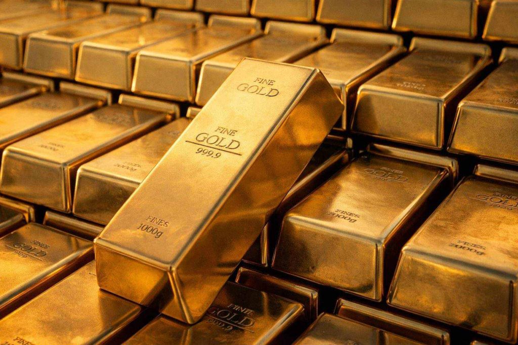 Gold price rebounds near $5,000 after rout as dollar eases; traders eye Iran talks and Fed data