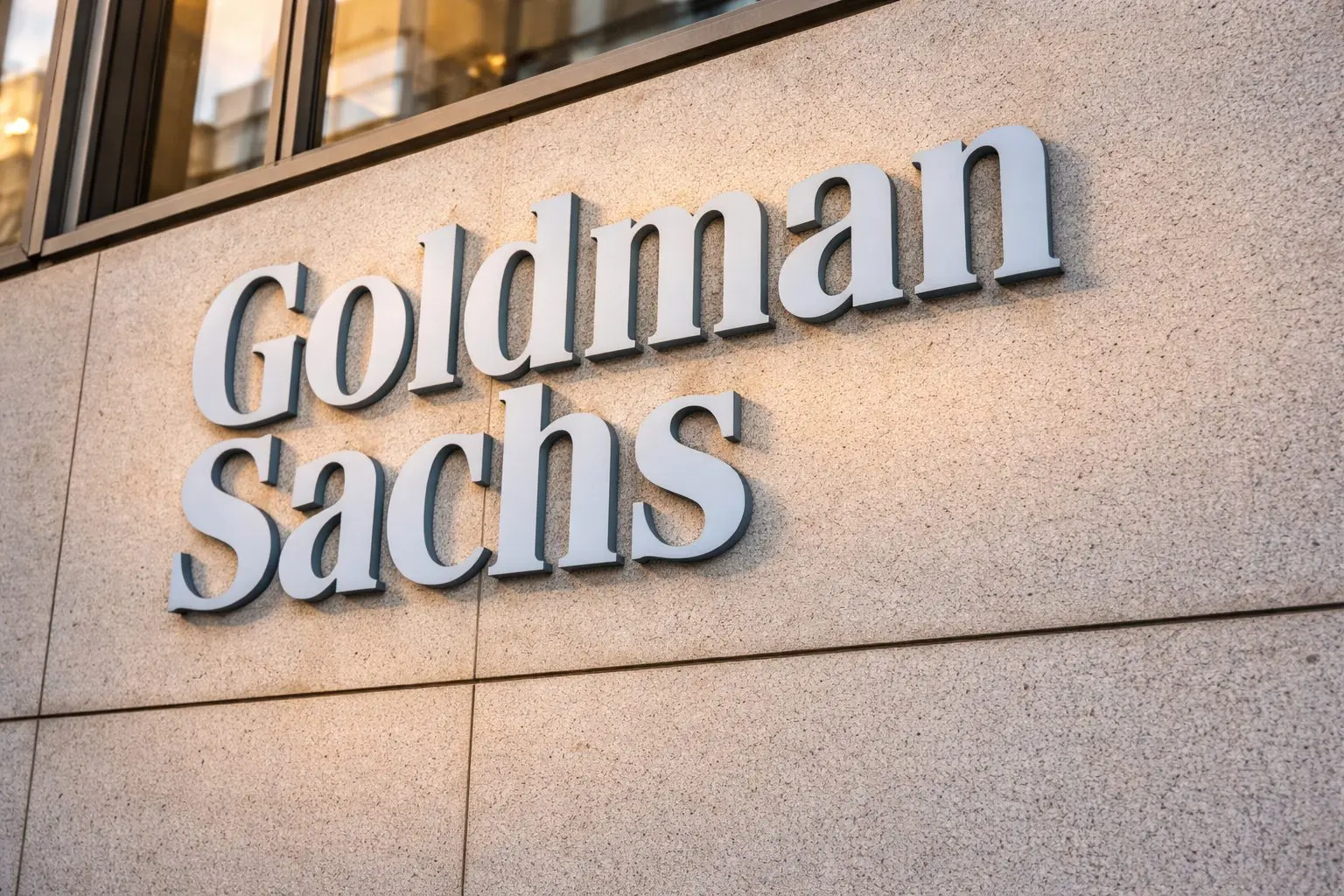 Goldman Sachs stock swings as hot inflation data meets new deal mandates