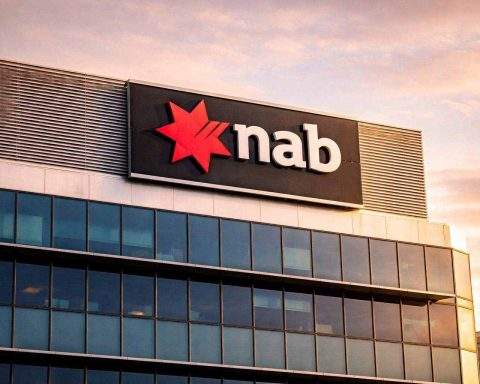 National Australia Bank share price holds near highs after Q1 update; brokers lift targets, but capital stays in focus