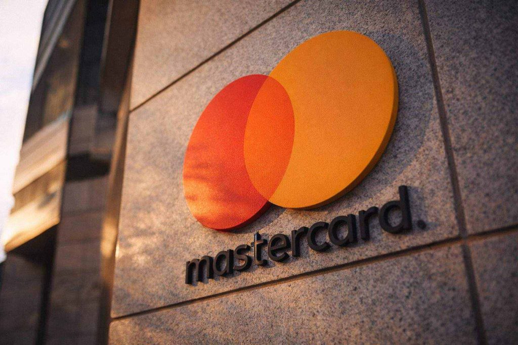 Mastercard stock price ticks up after hours on SoFi stablecoin settlement plan — what MA investors watch next