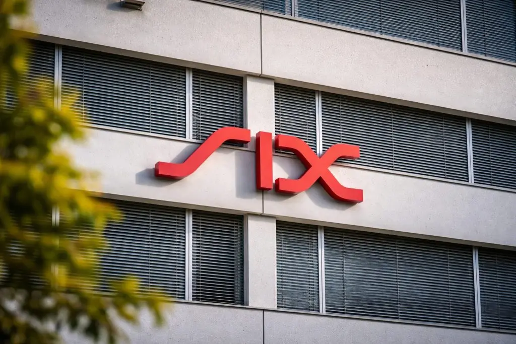 Swiss stocks hit 14,000 — Swiss Re, Holcim and UBS set up a busy week on SIX