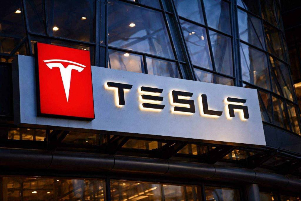 Tesla Stock Slips Despite China Sales Jump as Wall Street Cuts 2026 Forecasts