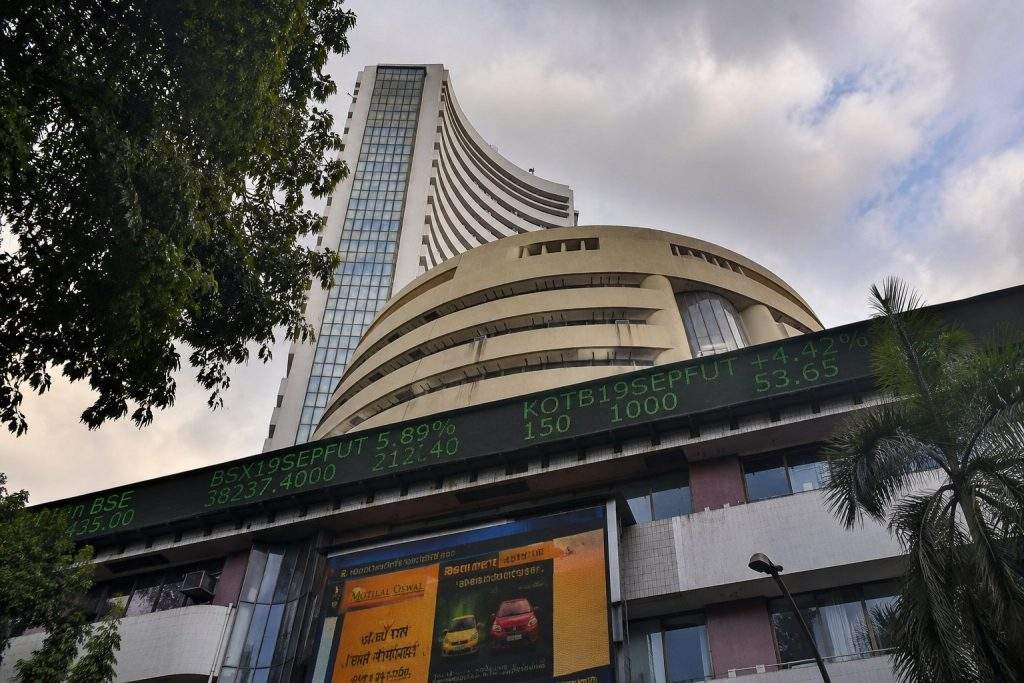 Sensex edges higher as oil slips, rupee firms
