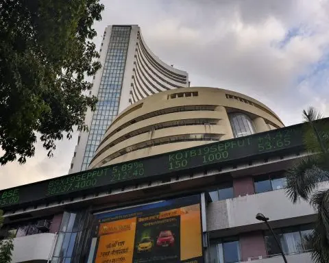 Sensex edges higher as oil slips, rupee firms
