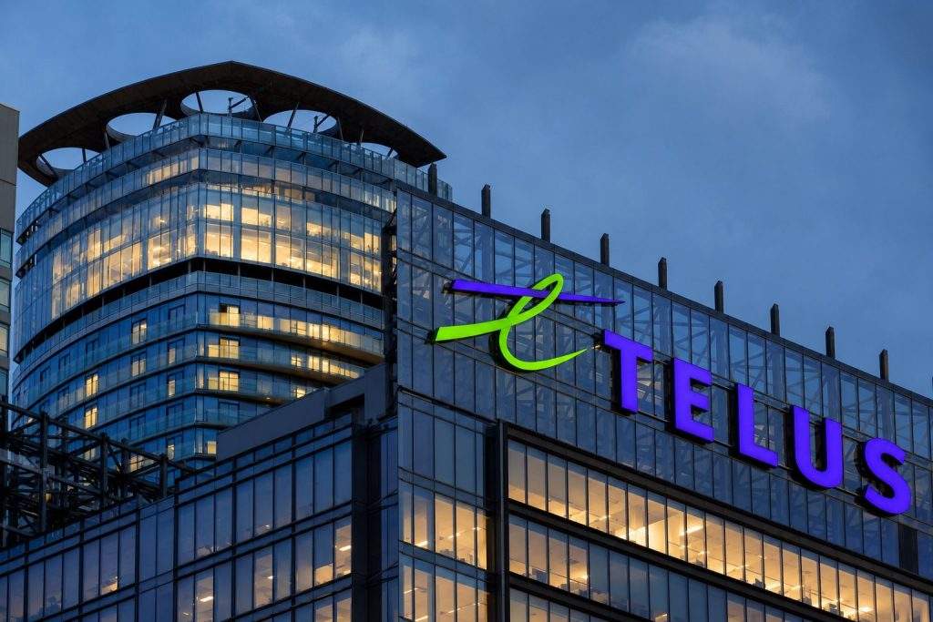 TELUS Investors Watch Dividend Timing After Vancouver Announcement