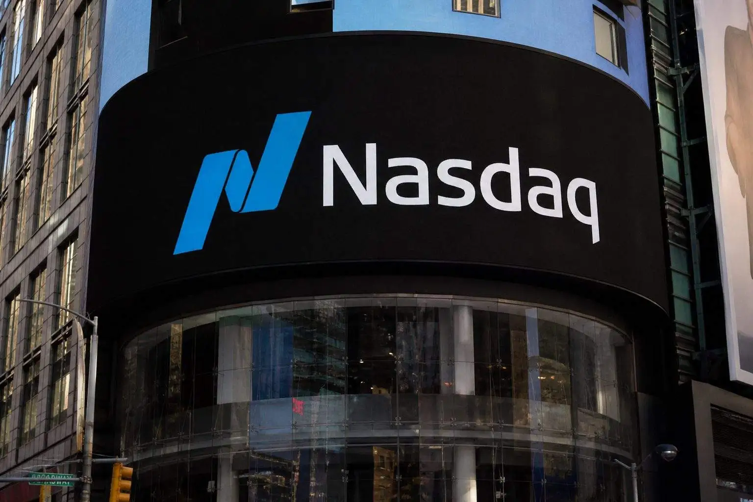 Nasdaq Rally Gets Its AI Spark Back as Intel, Micron, Alphabet and SanDisk Jump