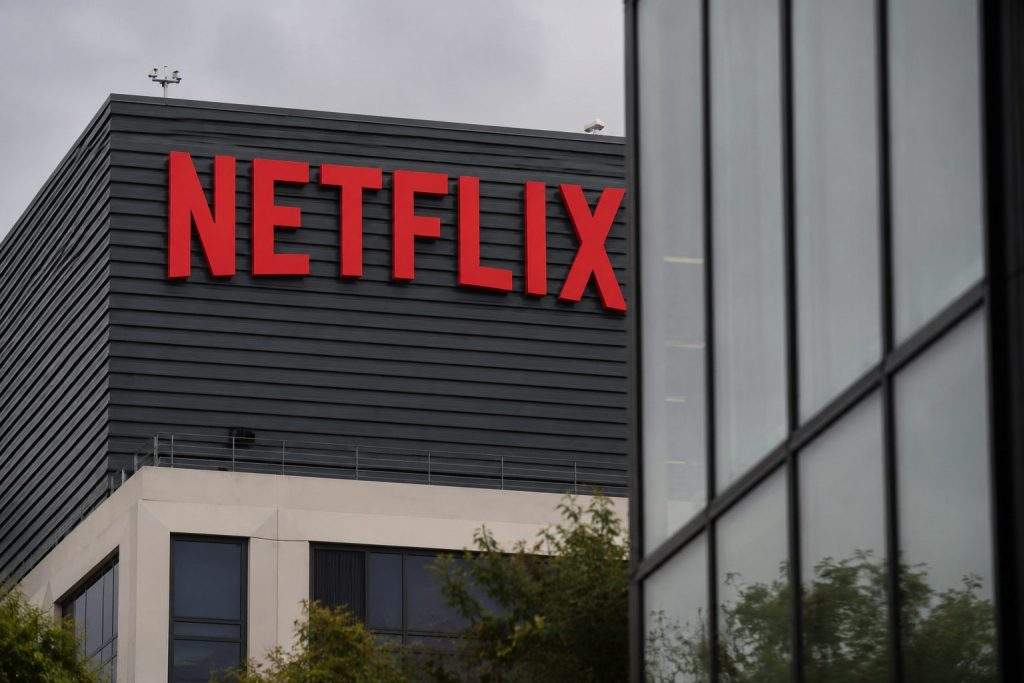 Netflix shares dip in shortened week, ad gains and deals in focus