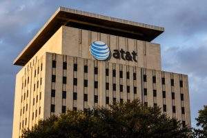 AT&T shares dip as fiber build-out runs into legacy line disputes