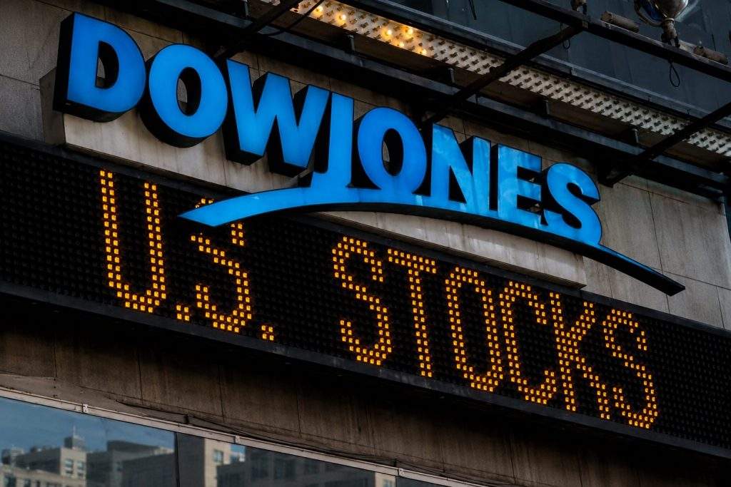 Dow slips in New York after jobs data boosts rate-hike talk