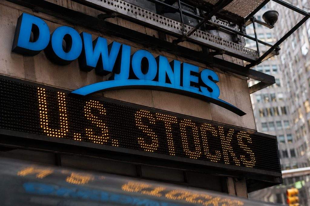 Dow tops 52,000 again as Caterpillar leads gains