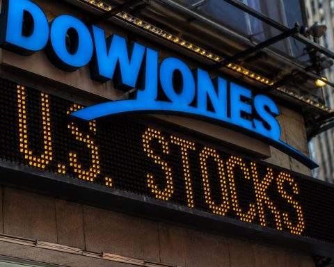Dow ends higher; Nasdaq drifts as AI stocks slip, oil falls