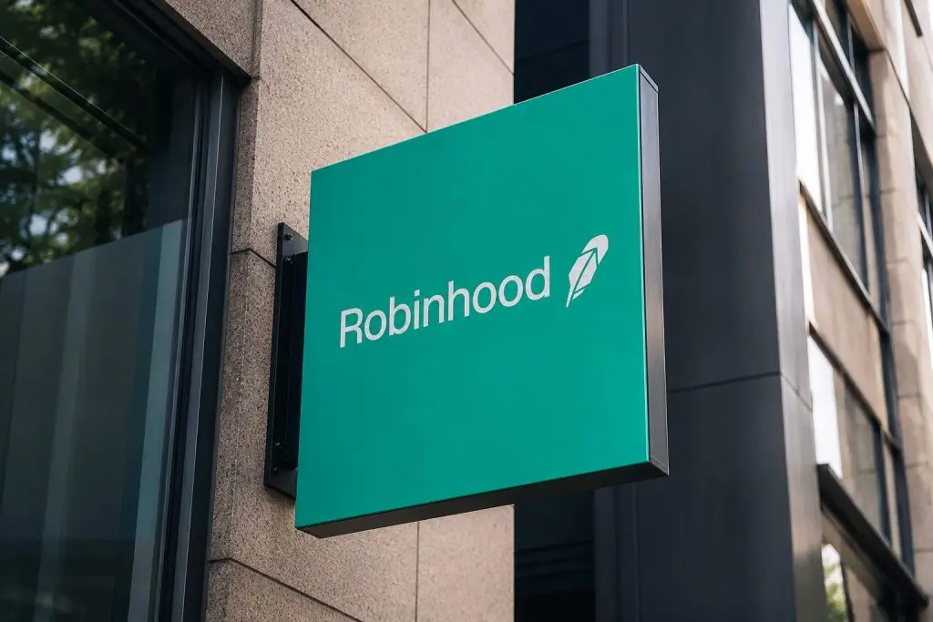 Robinhood climbs after job cuts, record trading volume