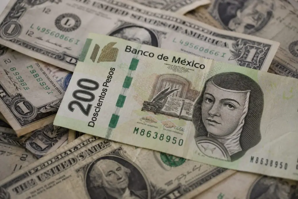 Peso falls after U.S. jobs surprise resets Fed expectations