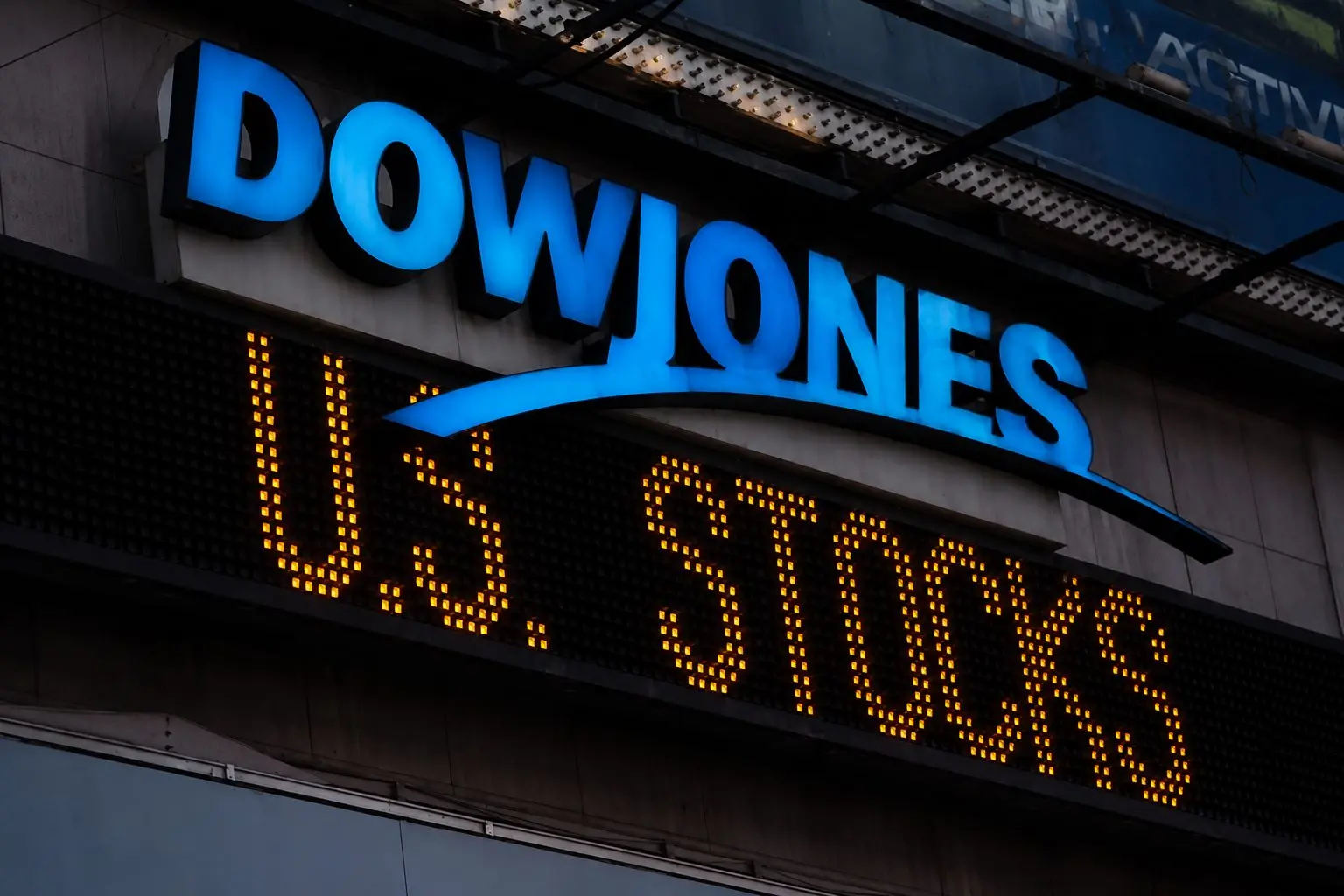 Dow slides late on fresh oil shock, stoking inflation and Fed worries