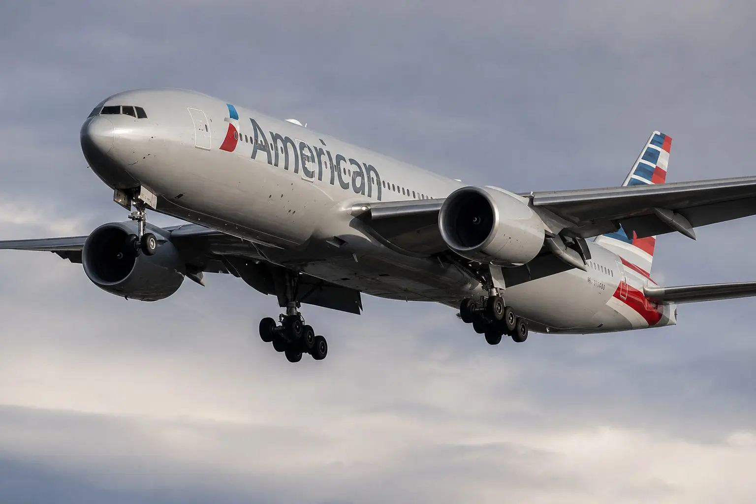 American Airlines extends run as oil slips, routes expand