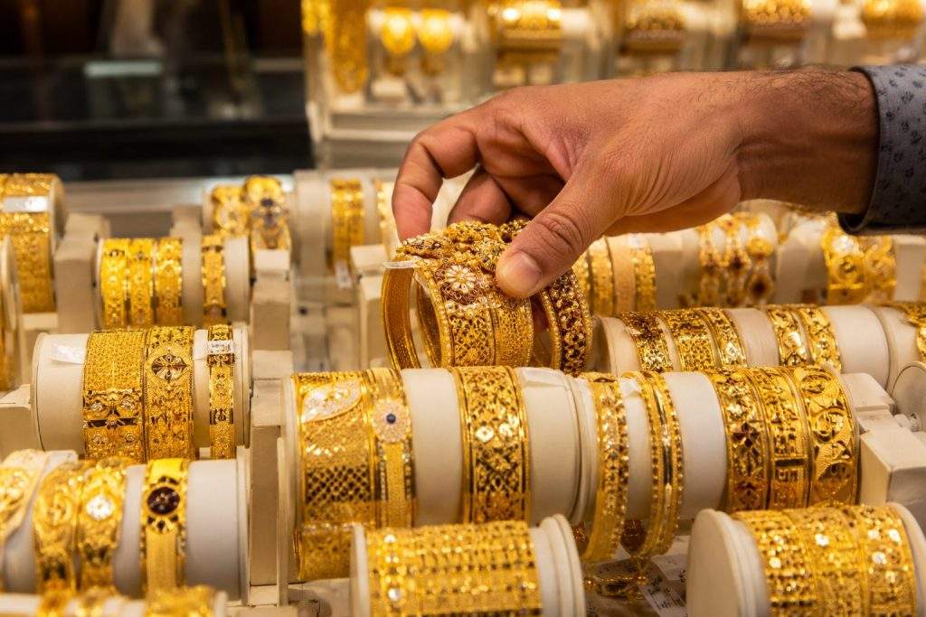 Gold jumps, oil falls after U.S.-Iran deal; dollar moves as Fed bets shift