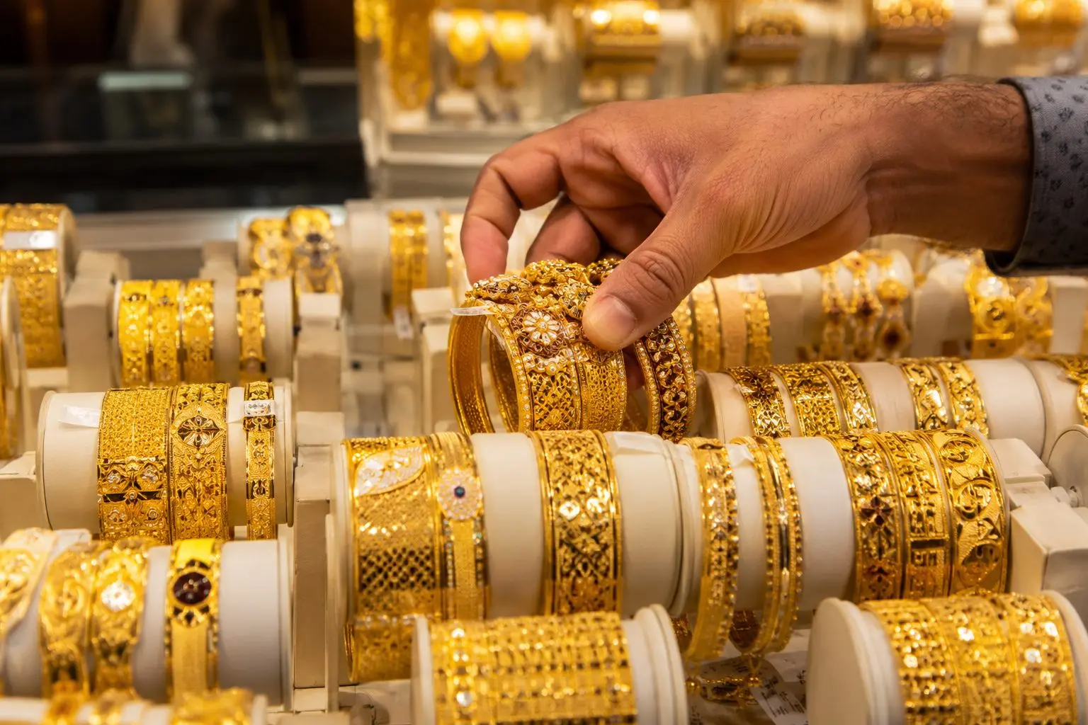 Gold jumps, oil falls after U.S.-Iran deal; dollar moves as Fed bets shift