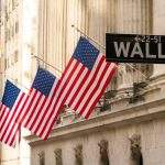 US stocks finish up as chip shares surge and oil falls