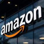Amazon Stock Slips as Over Half of AI-Linked Debt Hits Riskier Part of Bond Market