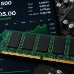 S&P 500 finishes at 7,533.77; chip downturn overshadows broad earnings gains