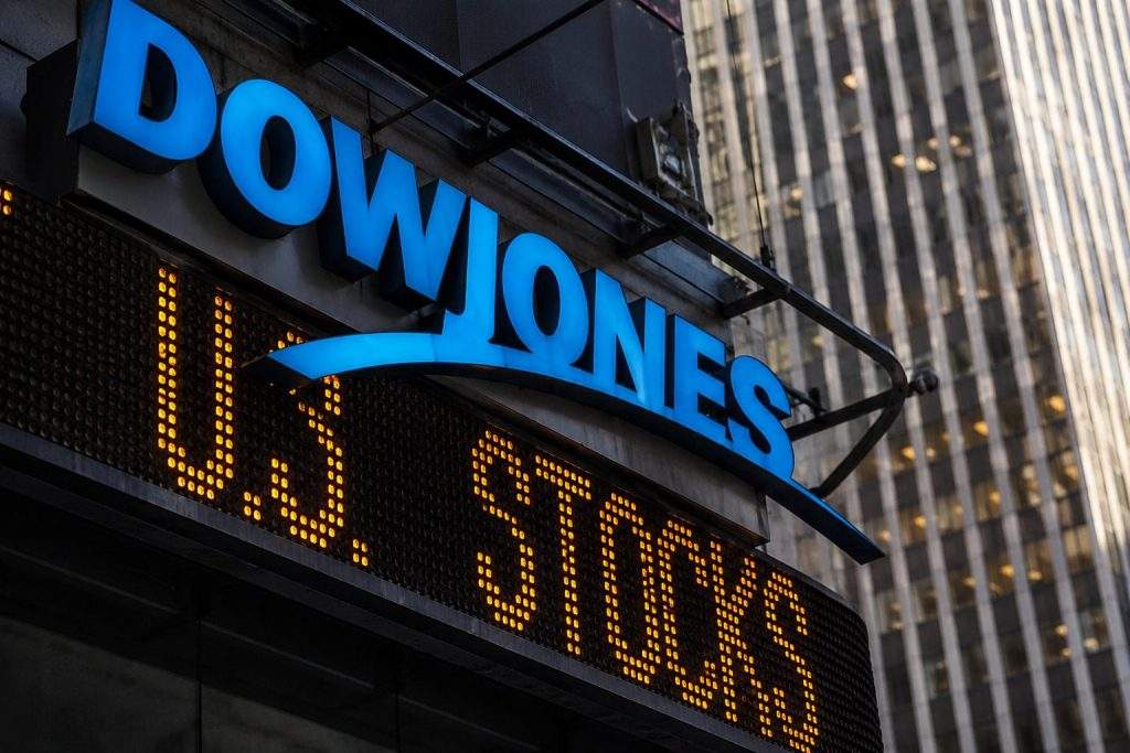 Dow drops nearly 1,150 points as Caterpillar and Goldman Sachs intensify Fed-driven slide