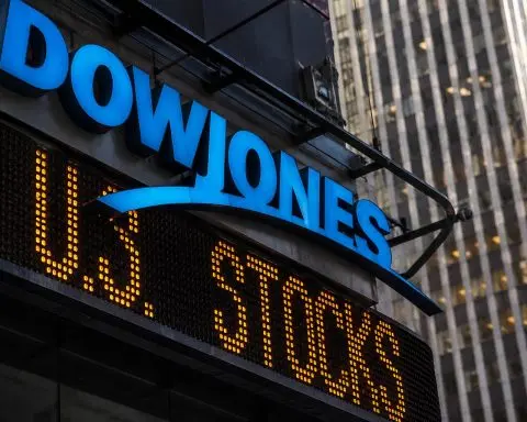 Dow drops nearly 1,150 points as Caterpillar and Goldman Sachs intensify Fed-driven slide