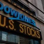 Dow Jones moves as oil climbs and rate hike bets rise