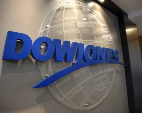Dow trades flat as two giants sway index by 922 points