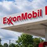 Exxon Mobil (NYSE:XOM) Drops in Premarket as Earnings Miss Estimates; Debt Reduction Still in Spotlight
