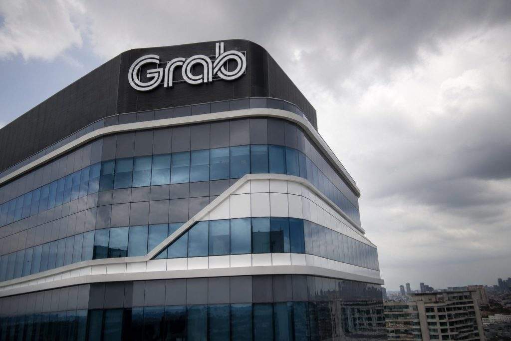 Grab Holdings (NASDAQ:GRAB) Falls After Q2 Profit Challenge Overshadows Revenue Milestone