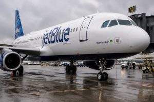 JetBlue (NASDAQ:JBLU) to Leave Manchester After 17 Months; Investors Eye Capacity Numbers