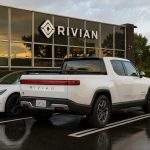 Rivian Shares (NASDAQ:RIVN) Remain Above Offer Price as Market Balances Dilution and Cash
