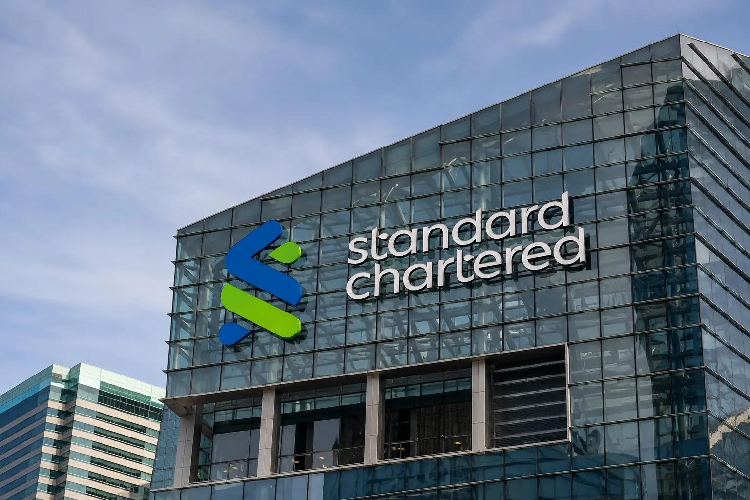 Standard Chartered dips; BlackRock’s wealth target capped at 5% valuation