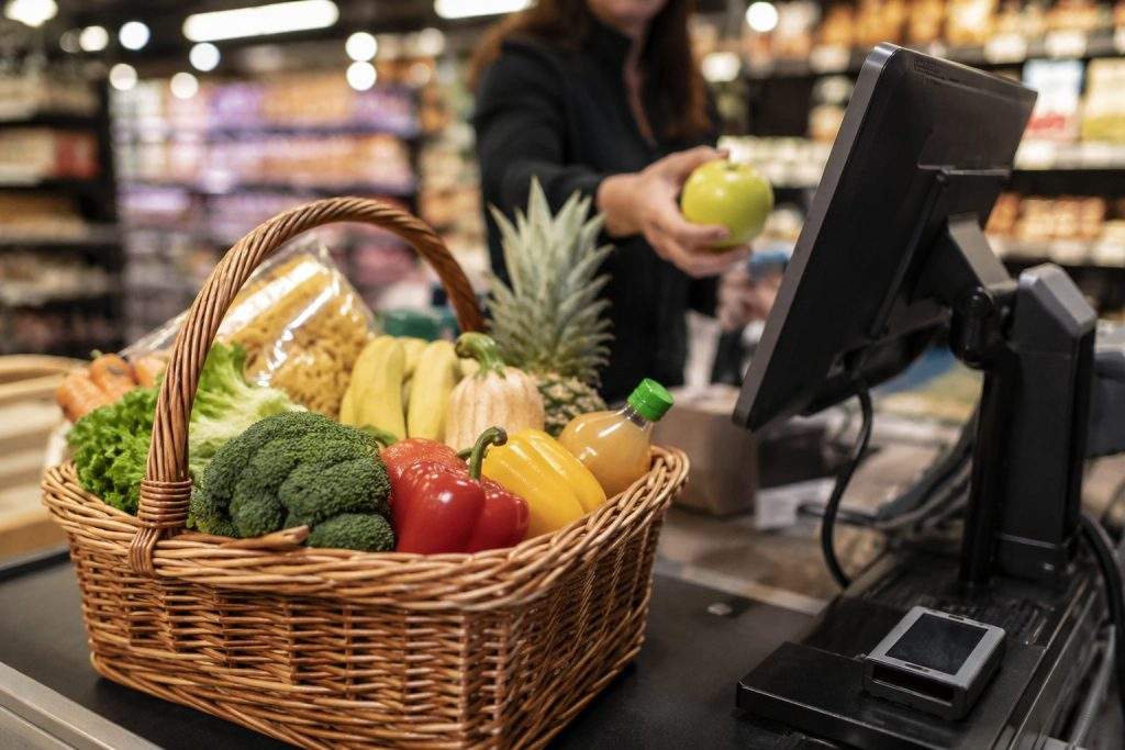 US consumer sentiment remains downbeat but spending holds steady, with staples leading