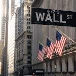Dow hits new high as Nasdaq chips fall ahead of Fed minutes