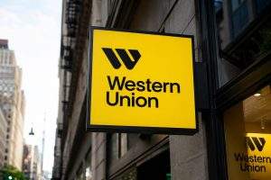 Western Union (NYSE:WU) falls 14% after trimmed profit highlights 13% dividend yield