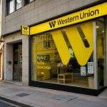 Western Union (NYSE:WU) shares jump 13% as merger spread almost doubles