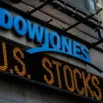 Dow Jones surpasses 54,000 for first time, Caterpillar leads surge