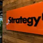 Strategy (NASDAQ:MSTR) Moves Back Above $100 as Bitcoin-Per-Share Edge Shrinks